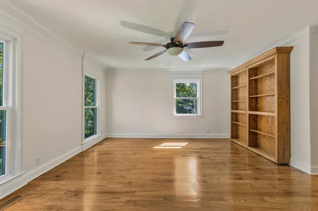 a kitchen with stainless steel appliances a stove top oven and refrigerator