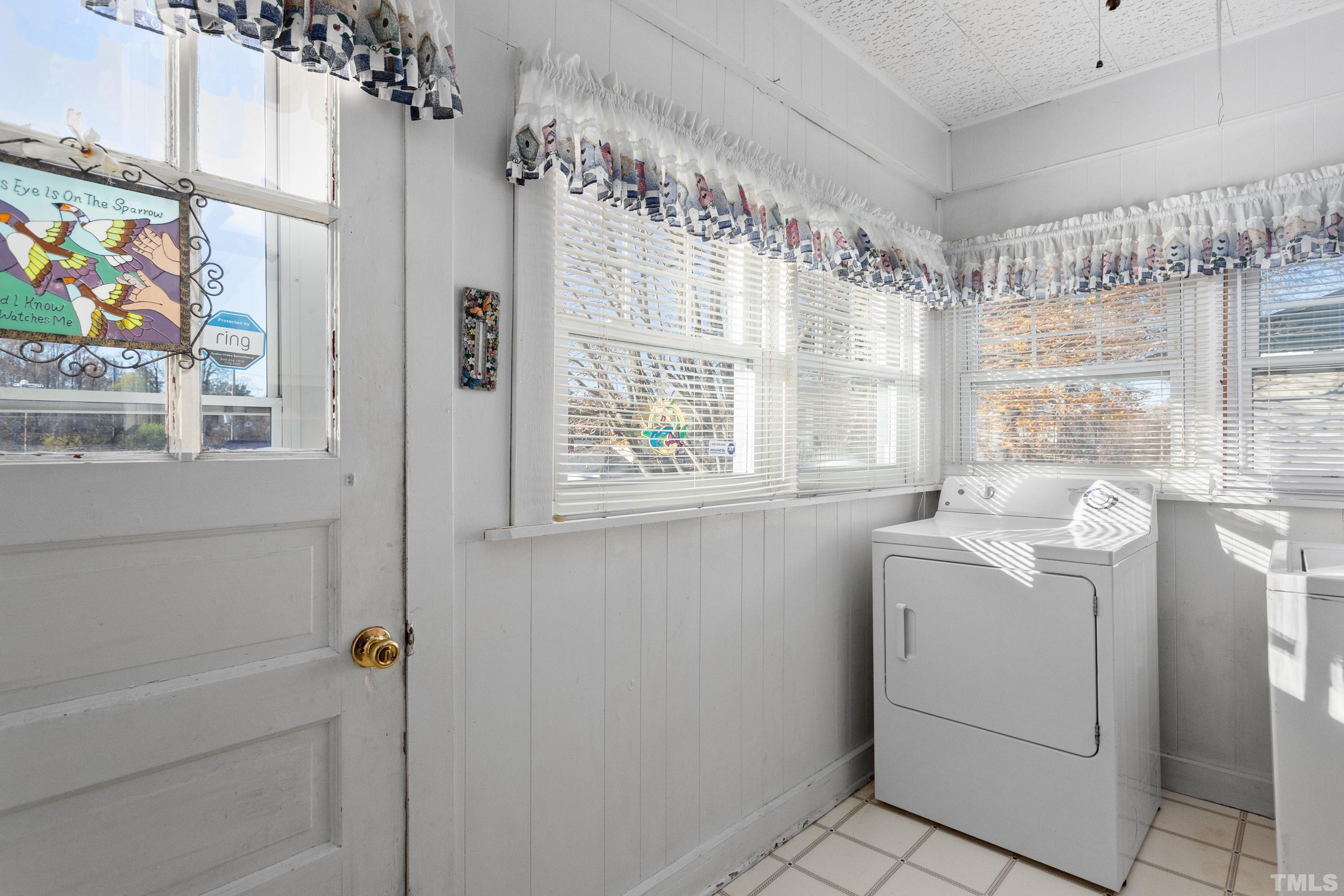 213 Edgar Street Roxboro, NC 27573 - Photo 23 of 29 a view of utility room with washer and dryer