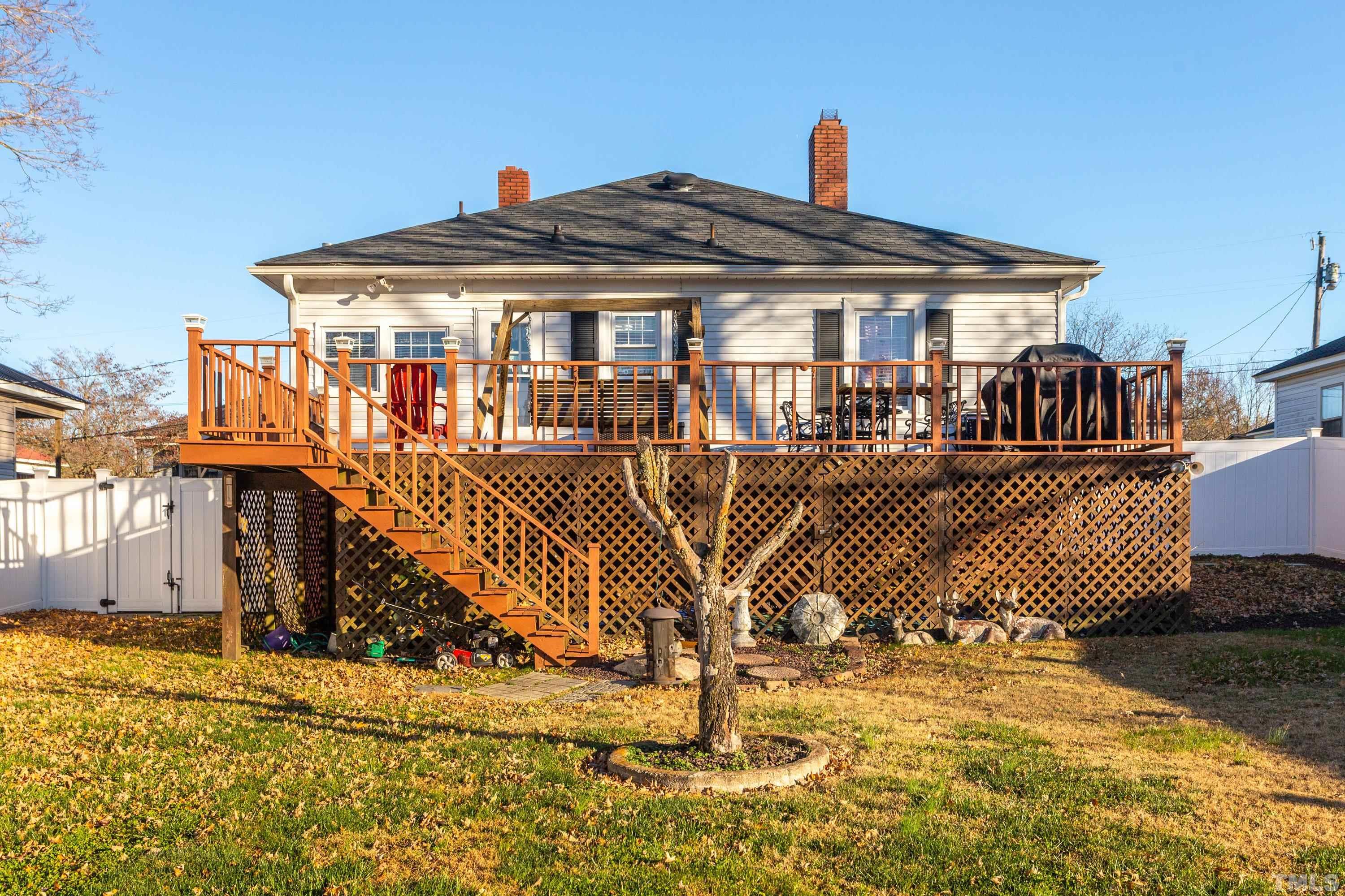 213 Edgar Street Roxboro, NC 27573 - Photo 29 of 29 a front view of a house with a yard