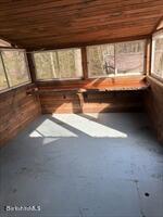 106 Shore Road Becket, MA 01223 - Photo 16 of 25 a view of an empty room with a window