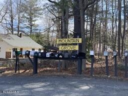 106 Shore Road Becket, MA 01223 - Photo 22 of 25 a sign that is on the side of the road