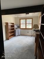 106 Shore Road Becket, MA 01223 - Photo 10 of 25 a living room with furniture and a window