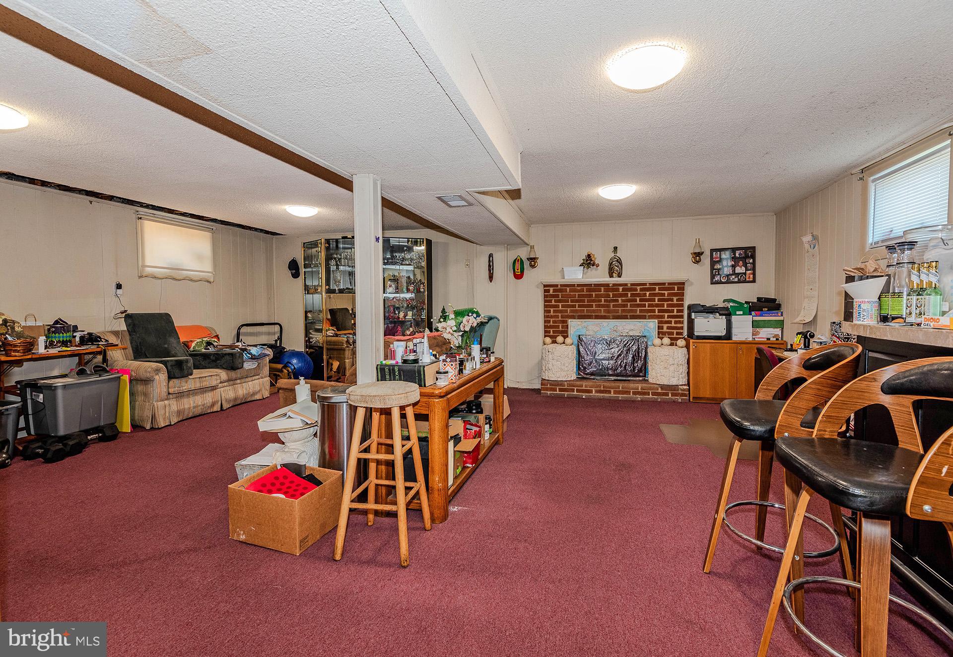 3505 South Forest Edge Road District Heights, MD 20747 - Photo 13 of 16 a living room with furniture and a flat screen tv