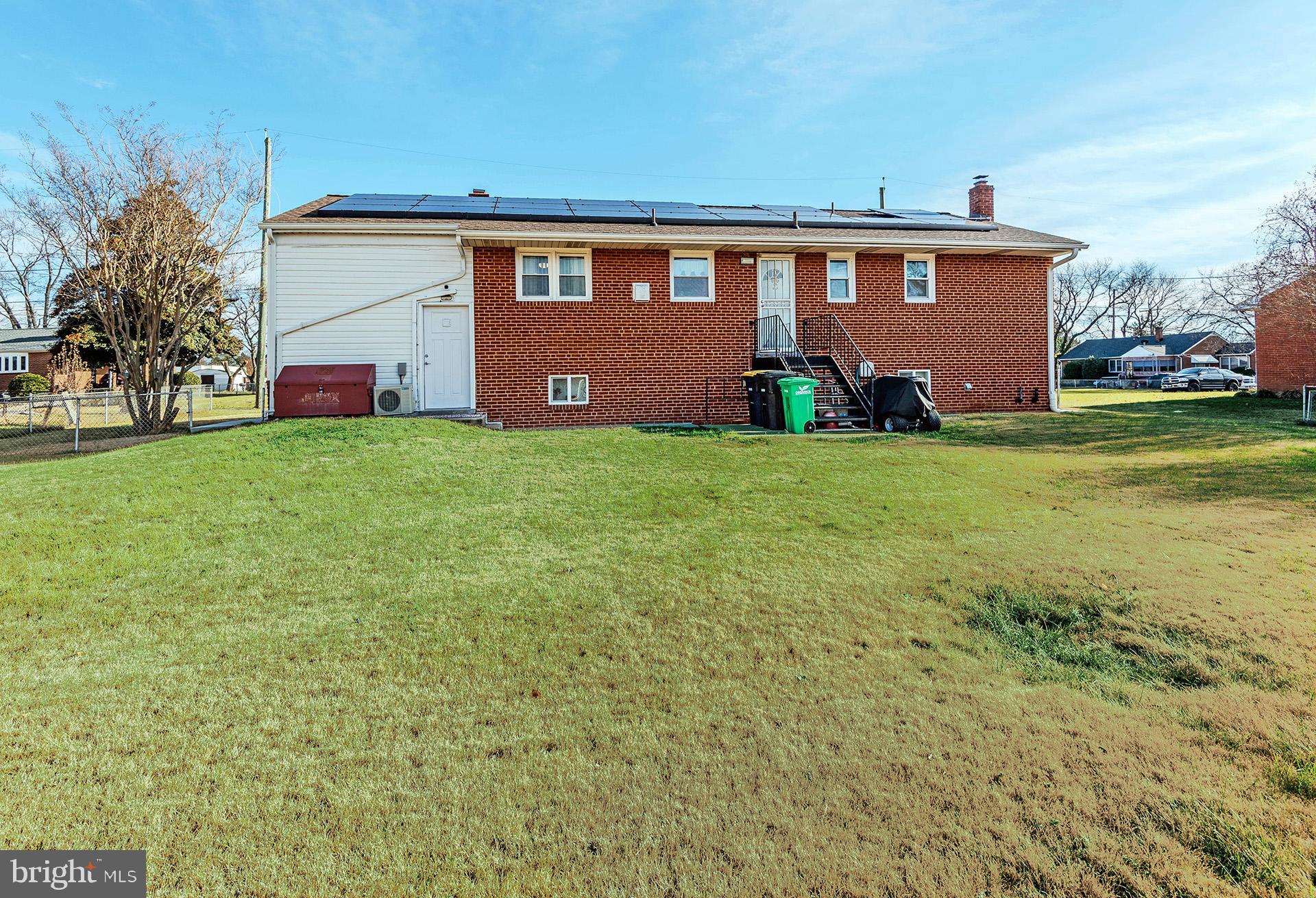 3505 South Forest Edge Road District Heights, MD 20747 - Photo 14 of 16 a front view of a house with garden