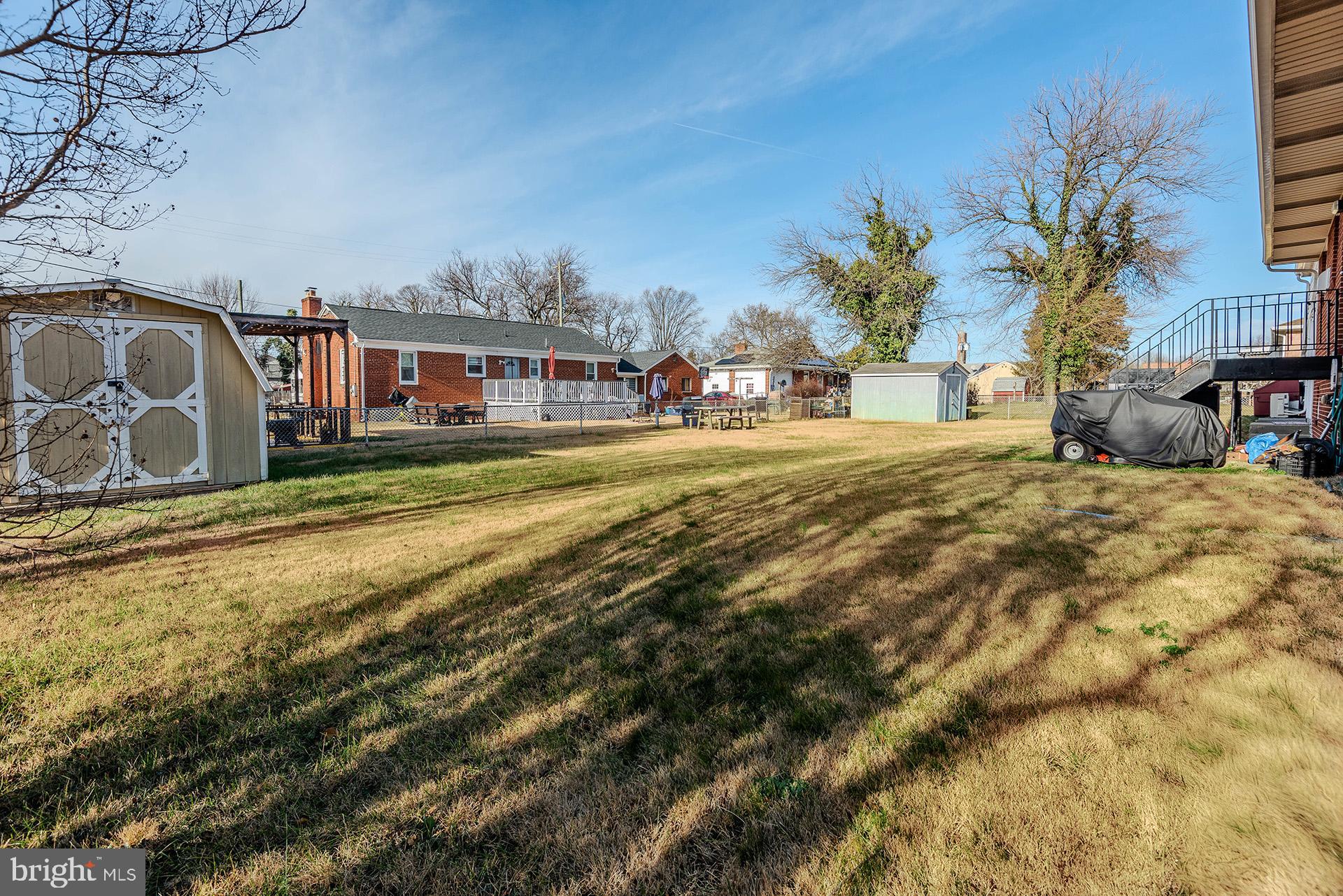 3505 South Forest Edge Road District Heights, MD 20747 - Photo 16 of 16 a view of a house with a yard