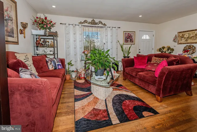 a living room with furniture and a couch
