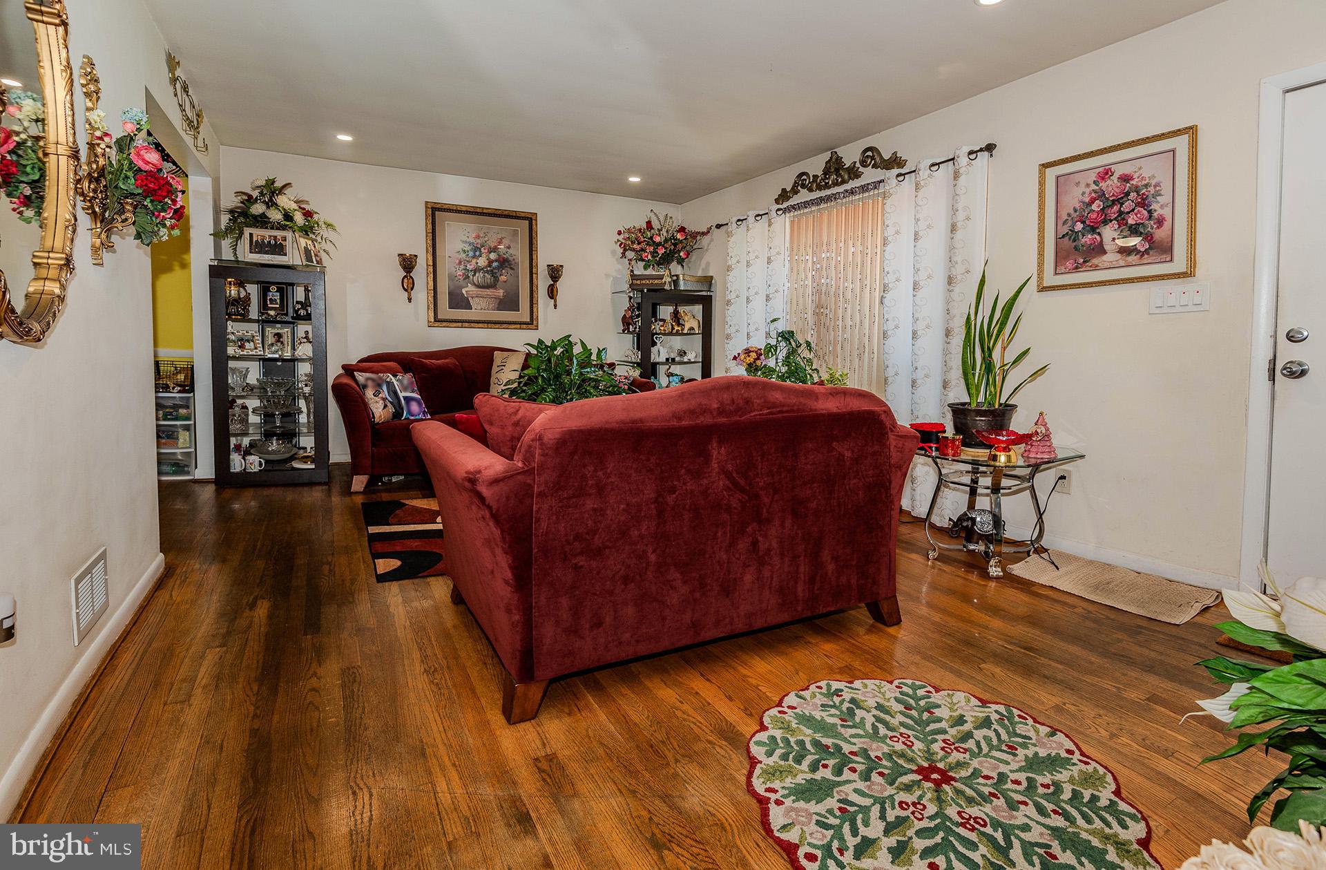 3505 South Forest Edge Road District Heights, MD 20747 - Photo 4 of 16 a living room with furniture and a rug