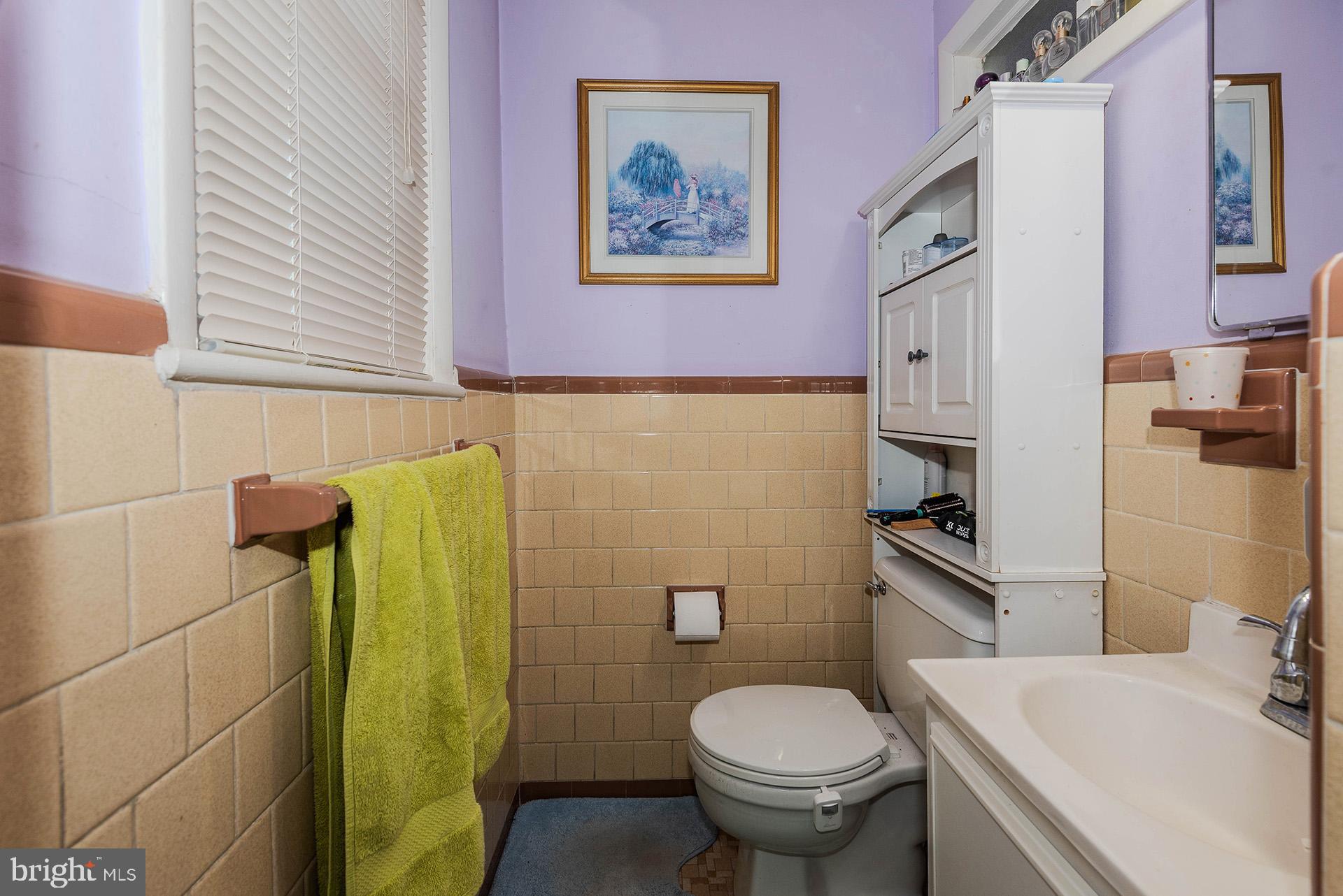 3505 South Forest Edge Road District Heights, MD 20747 - Photo 8 of 16 a bathroom with a sink and toilet