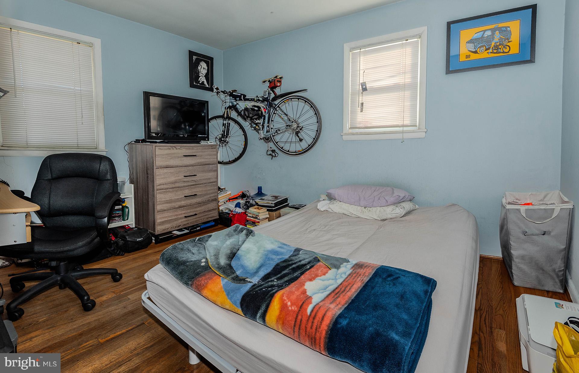 3505 South Forest Edge Road District Heights, MD 20747 - Photo 9 of 16 a bedroom with furniture and a window