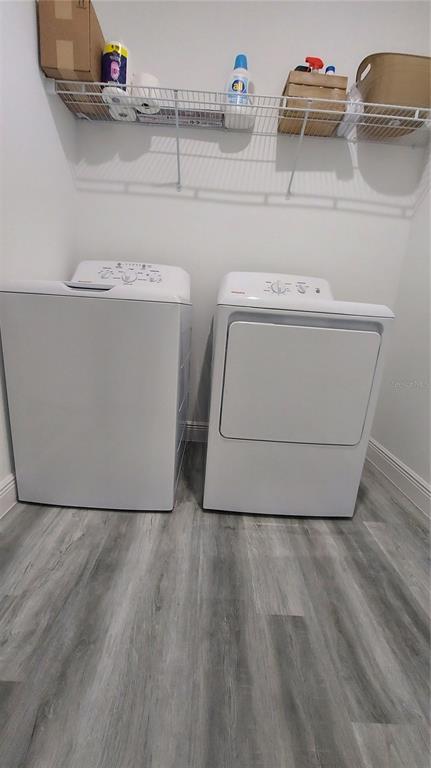 5984 Southwest 128th Street Road Ocala, FL 34473 - Photo 11 of 23 a utility room with a washer and dryer