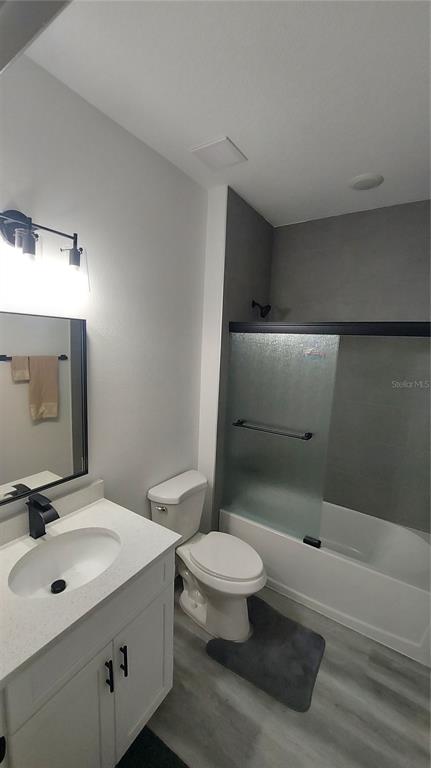 5984 Southwest 128th Street Road Ocala, FL 34473 - Photo 19 of 23 a bathroom with a sink a toilet and shower