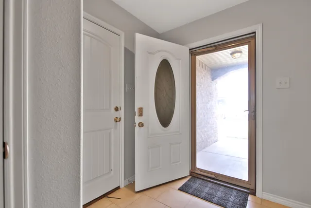 a close view of a utility room with mirror
