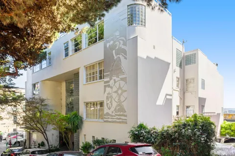 a view of city with tall buildings