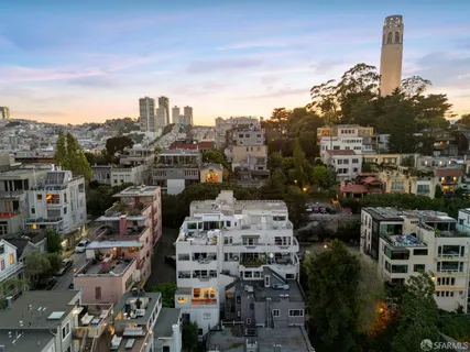 a kitchen with a table and chairs