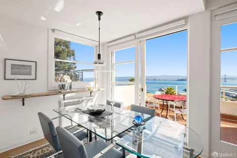 a kitchen with sink a stove and refrigerator