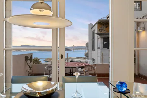 a view of a workspace with furniture