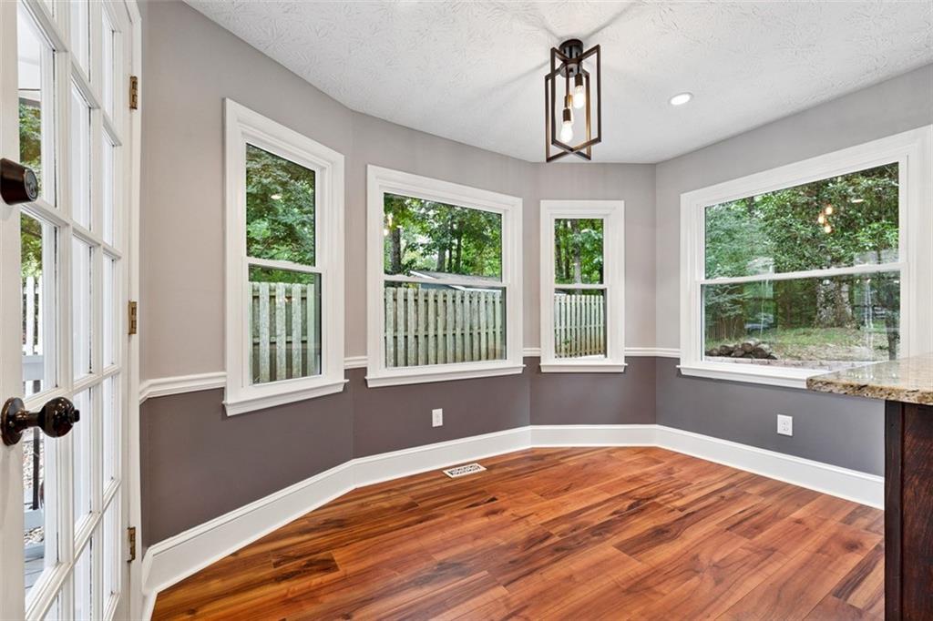 2017 Parsons Ridge Duluth, GA 30097 - Photo 15 of 53 a view of empty room with wooden floor and fan