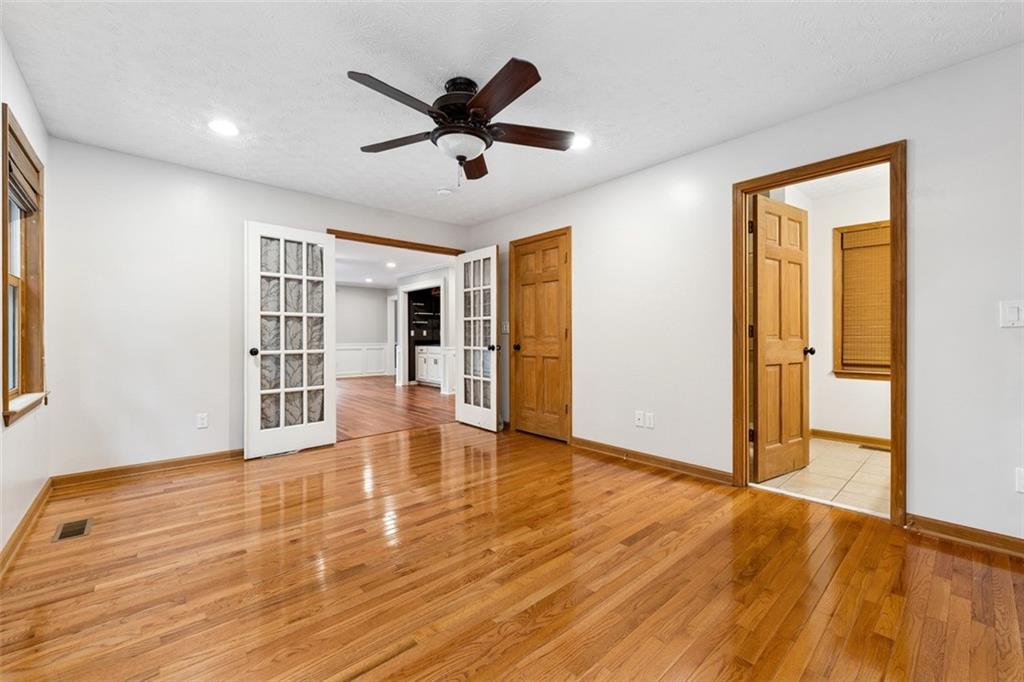 2017 Parsons Ridge Duluth, GA 30097 - Photo 17 of 53 a view of empty room with wooden floor and window
