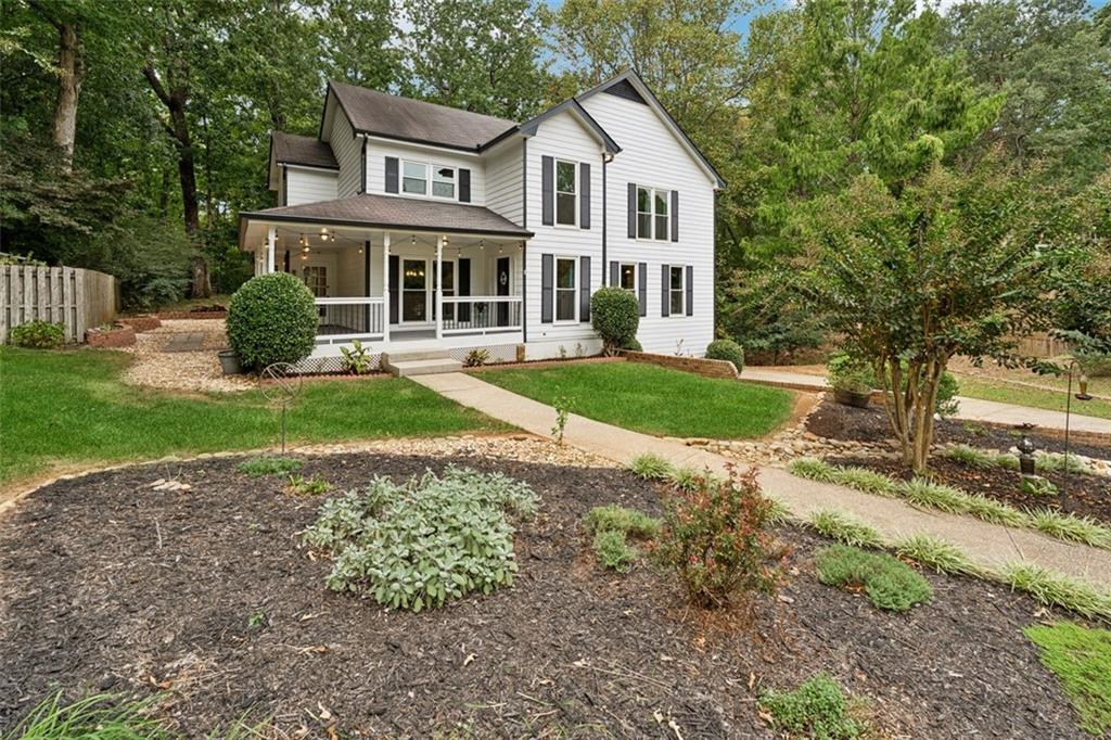 2017 Parsons Ridge Duluth, GA 30097 - Photo 2 of 53 a front view of a house with a yard
