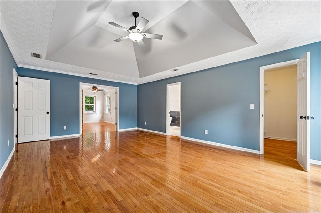 2017 Parsons Ridge Duluth, GA 30097 - Photo 22 of 53 a view of an empty room with wooden floor