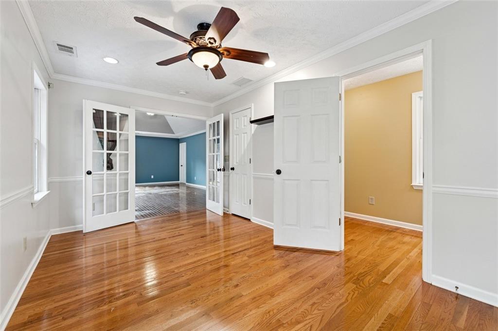 2017 Parsons Ridge Duluth, GA 30097 - Photo 28 of 53 a view of empty room with wooden floor and fan