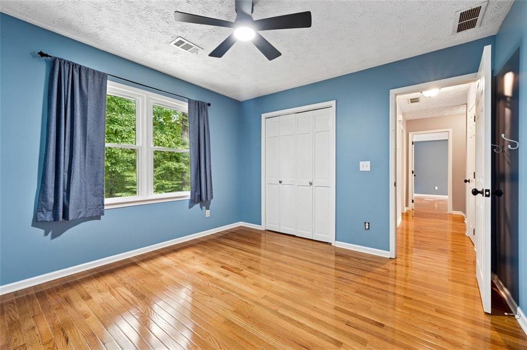 2017 Parsons Ridge Duluth, GA 30097 - Photo 33 of 53 a view of empty room with wooden floor and fan