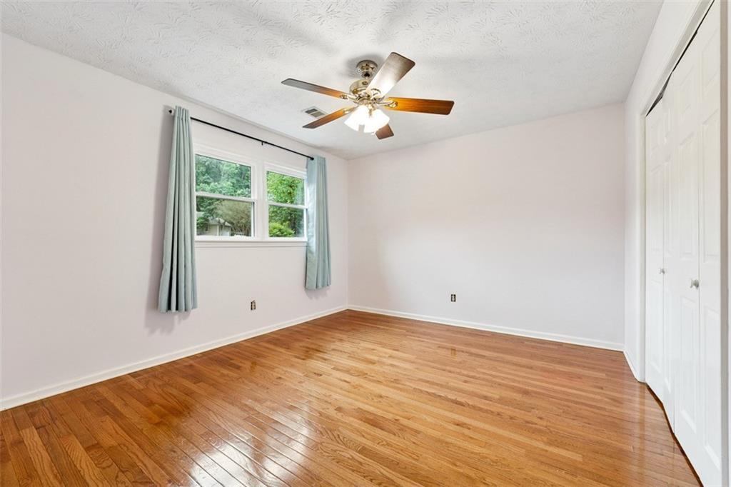 2017 Parsons Ridge Duluth, GA 30097 - Photo 35 of 53 wooden floor in an empty room with a window