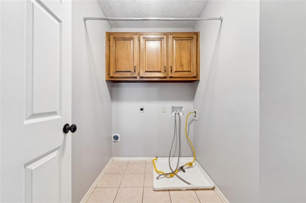 2017 Parsons Ridge Duluth, GA 30097 - Photo 36 of 53 a utility room with dryer and washer