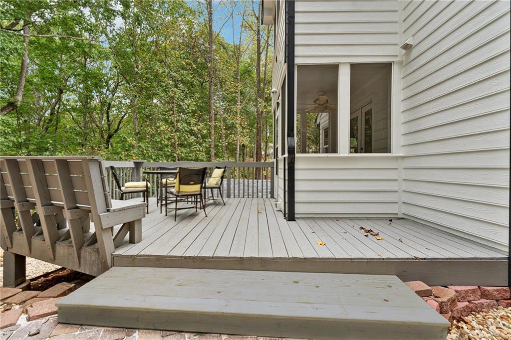 2017 Parsons Ridge Duluth, GA 30097 - Photo 45 of 53 a view of a wooden deck with furniture