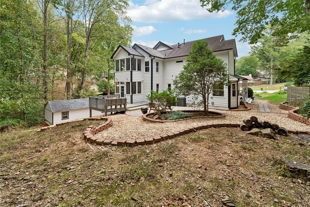 2017 Parsons Ridge Duluth, GA 30097 - Photo 46 of 53 a view of a house with backyard and sitting area