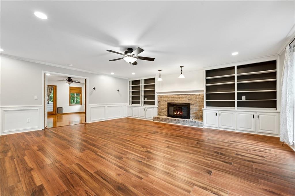2017 Parsons Ridge Duluth, GA 30097 - Photo 7 of 53 a view of an empty room with a fireplace and a window