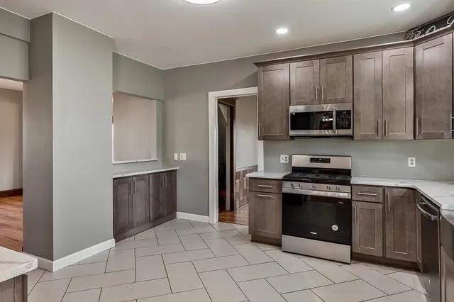 a living room with fireplace