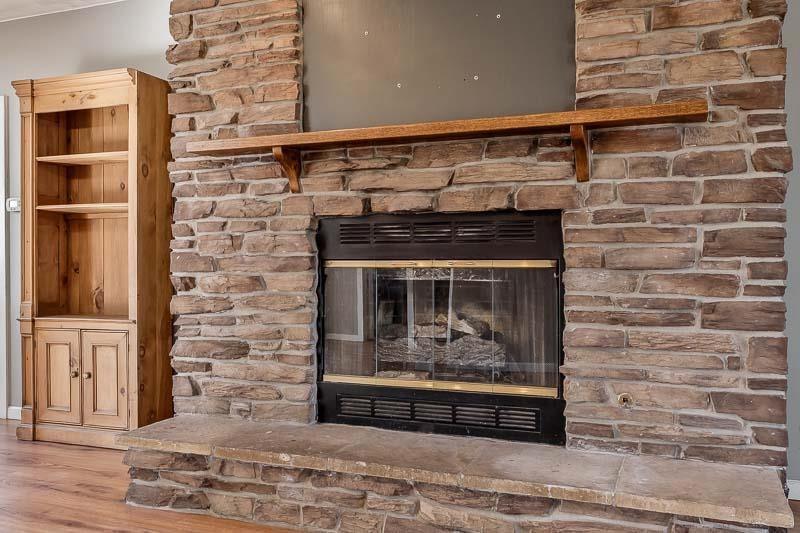 15685 West State Road Pecatonica, IL 61063 - Photo 20 of 69 a living room with fireplace