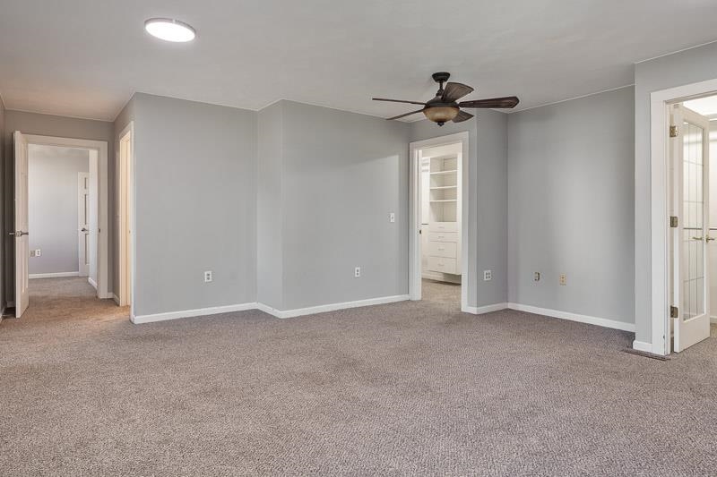15685 West State Road Pecatonica, IL 61063 - Photo 40 of 69 an empty room with chandelier fan