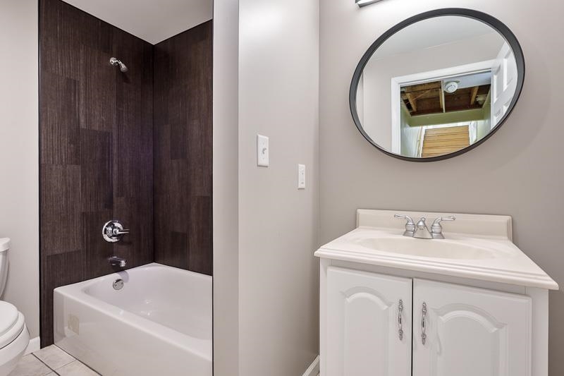 15685 West State Road Pecatonica, IL 61063 - Photo 45 of 69 a bathroom with a sink and a mirror