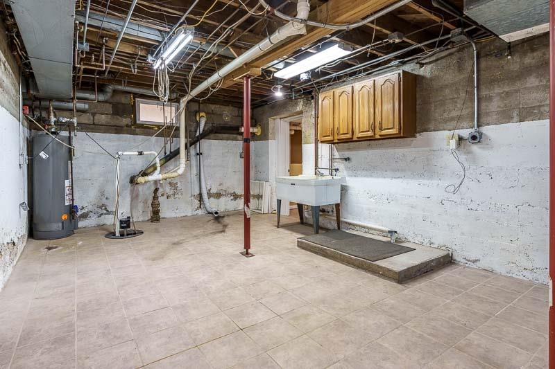 15685 West State Road Pecatonica, IL 61063 - Photo 51 of 69 a view of water heater room with wooden roof