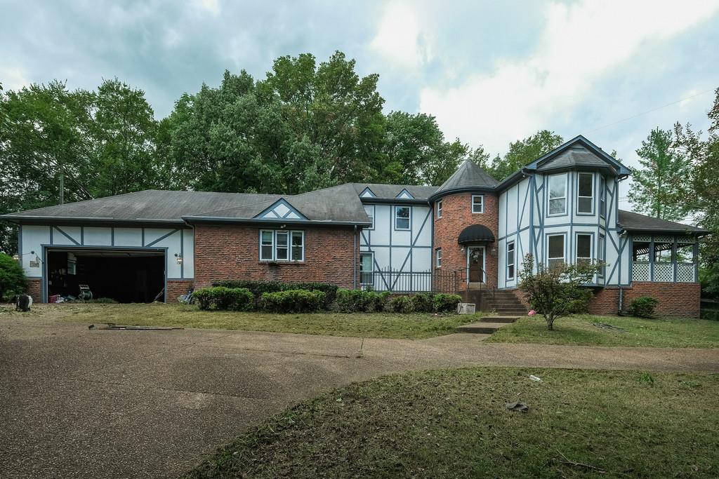 6145 Pettus Road Antioch, TN 37013 - Photo 1 of 29 2 Car Garage on Left and another Detached 2 Car Garage behind the home.
