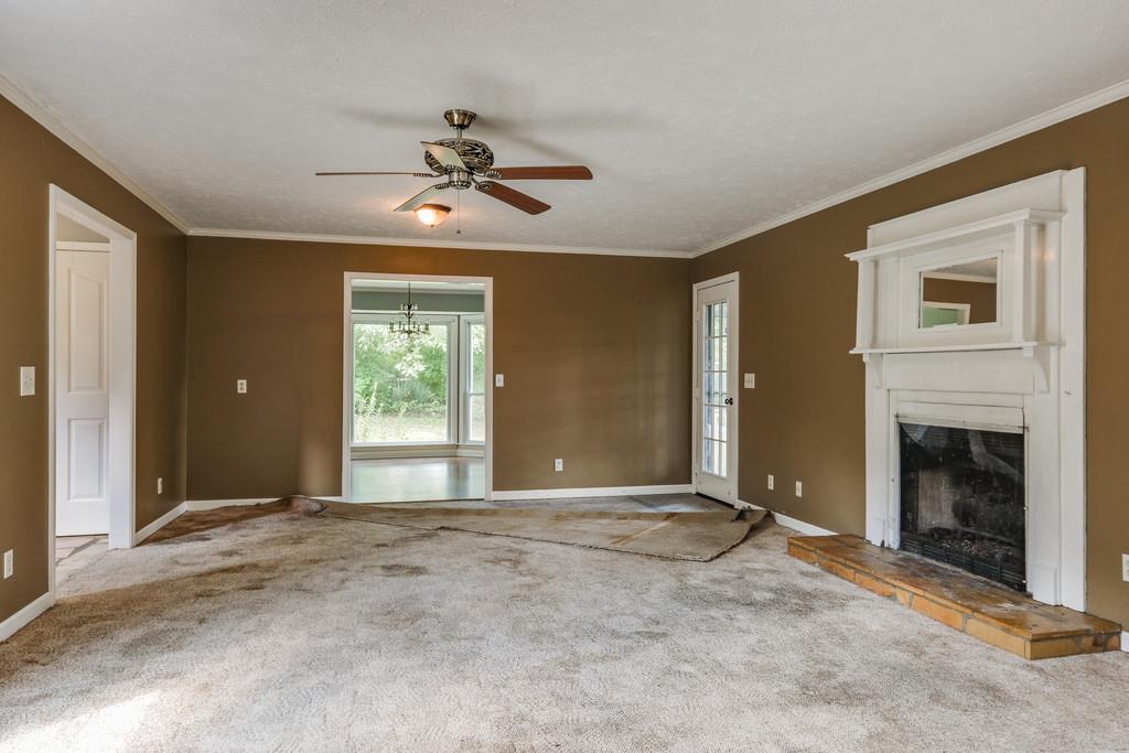 6145 Pettus Road Antioch, TN 37013 - Photo 5 of 29 Fireplace and exterior door leads to covered porch