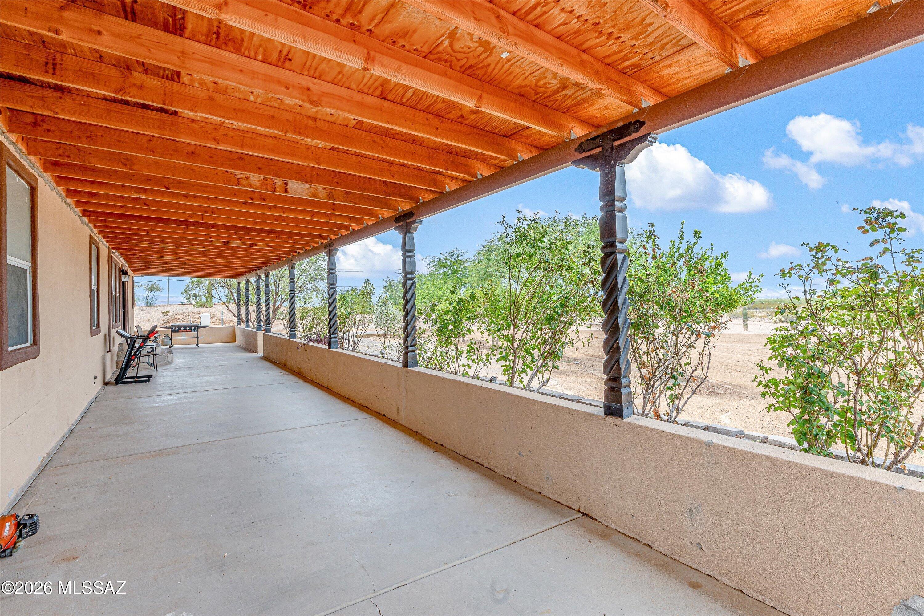 10935 South Swan Road Tucson, AZ 85756 - Photo 9 of 41 Covered front porch with custom columns! Wow