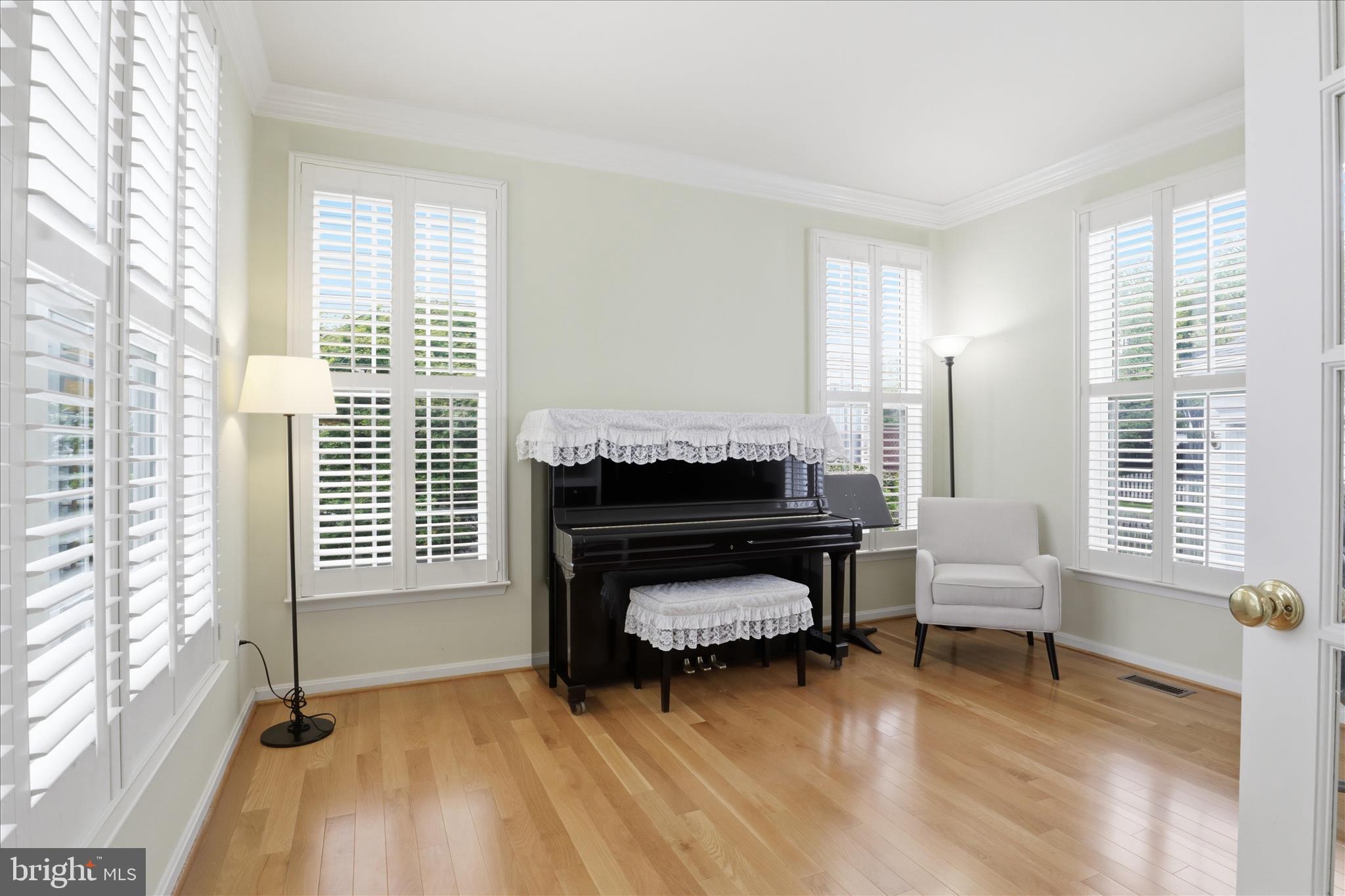 25352 Ripleys Field Drive Chantilly, VA 20152 - Photo 13 of 54 a bedroom with furniture and a window