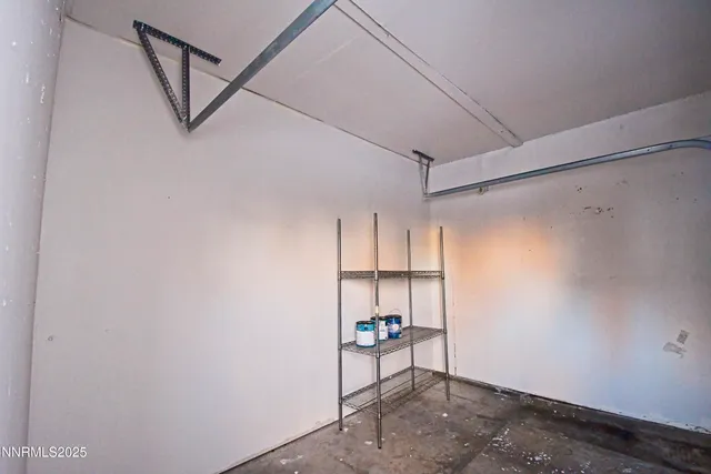 a view of a room with racks on the wall