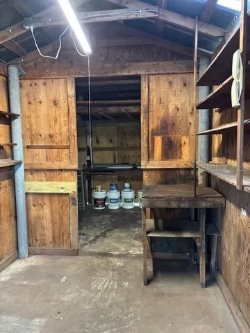 a room with furniture and a window