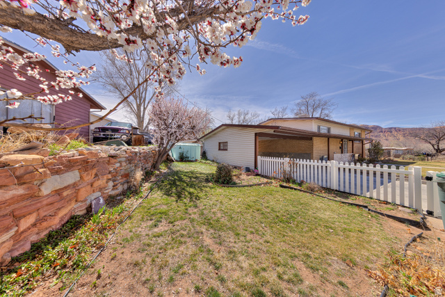738 Locust Lane Moab, UT 84532 - Photo 20 of 25 Fenced yard with a mountain view
