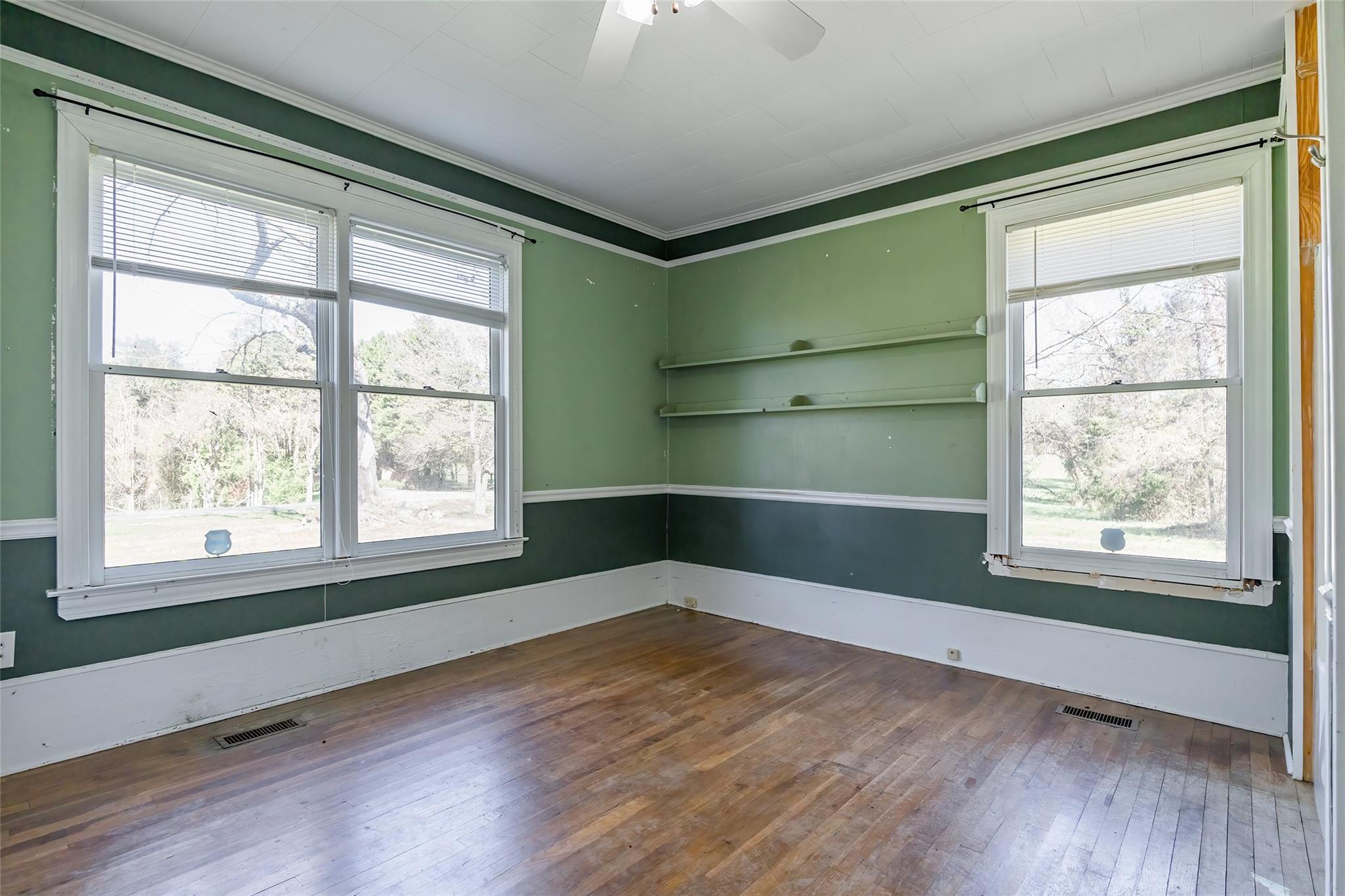 530 Cedar Grove Road York, SC 29745 - Photo 16 of 41 an empty room with wooden floor and windows