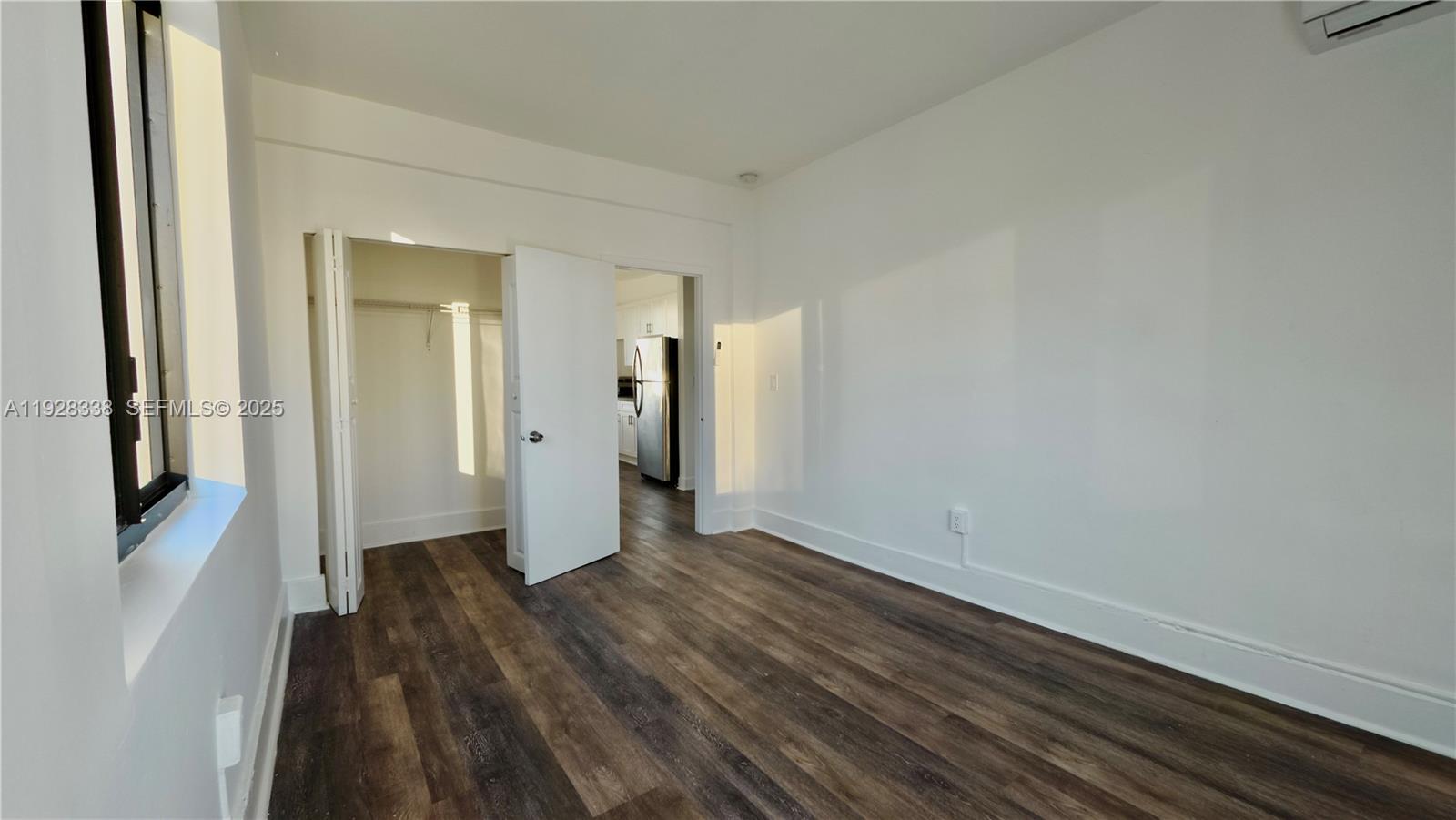 337 Southwest 5th Avenue, Unit 12 Miami, FL 33130 - Photo 11 of 21 a view of a hallway with wooden floor