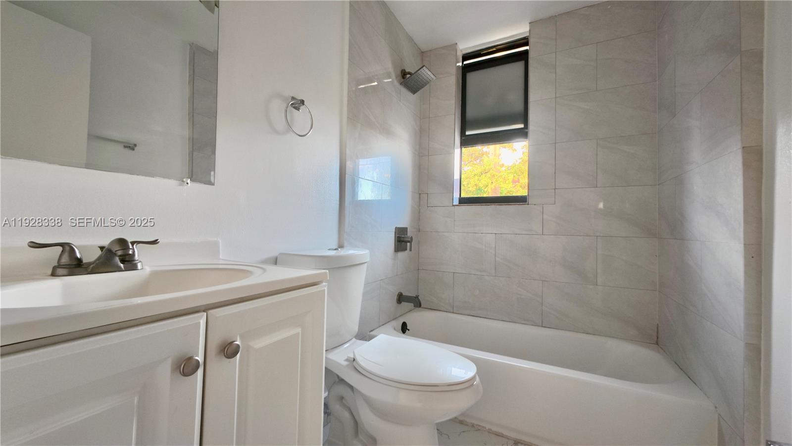 337 Southwest 5th Avenue, Unit 12 Miami, FL 33130 - Photo 20 of 21 a bathroom with a sink toilet and shower