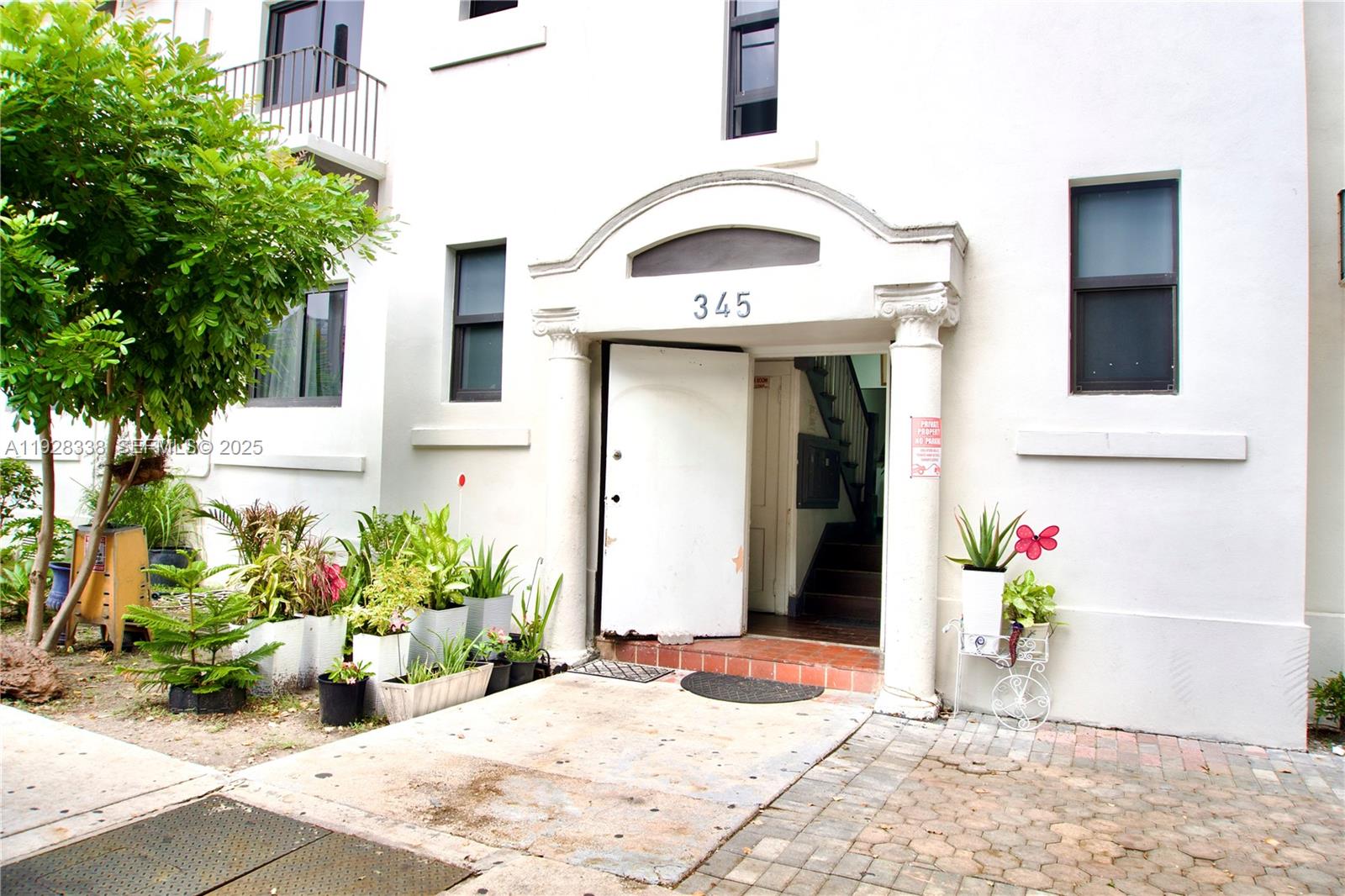 337 Southwest 5th Avenue, Unit 12 Miami, FL 33130 - Photo 21 of 21 a view of a house with potted plants