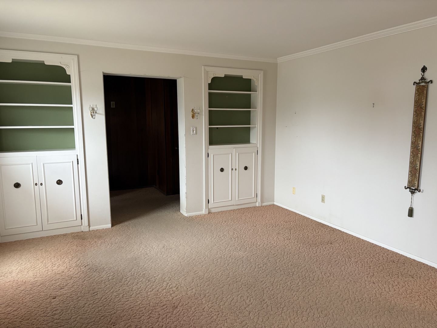 1740 Frazier Avenue Centralia, IL 62801 - Photo 4 of 12 an empty room with windows and cabinet