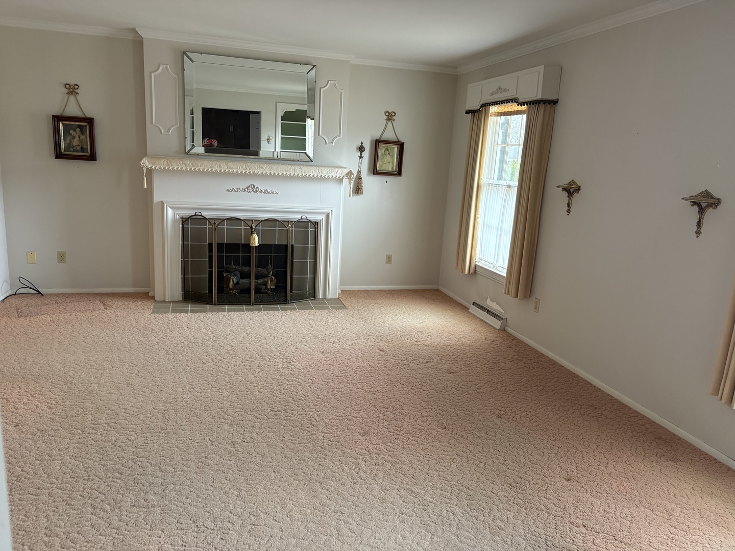 1740 Frazier Avenue Centralia, IL 62801 - Photo 5 of 12 a view of an empty room with window and fireplace