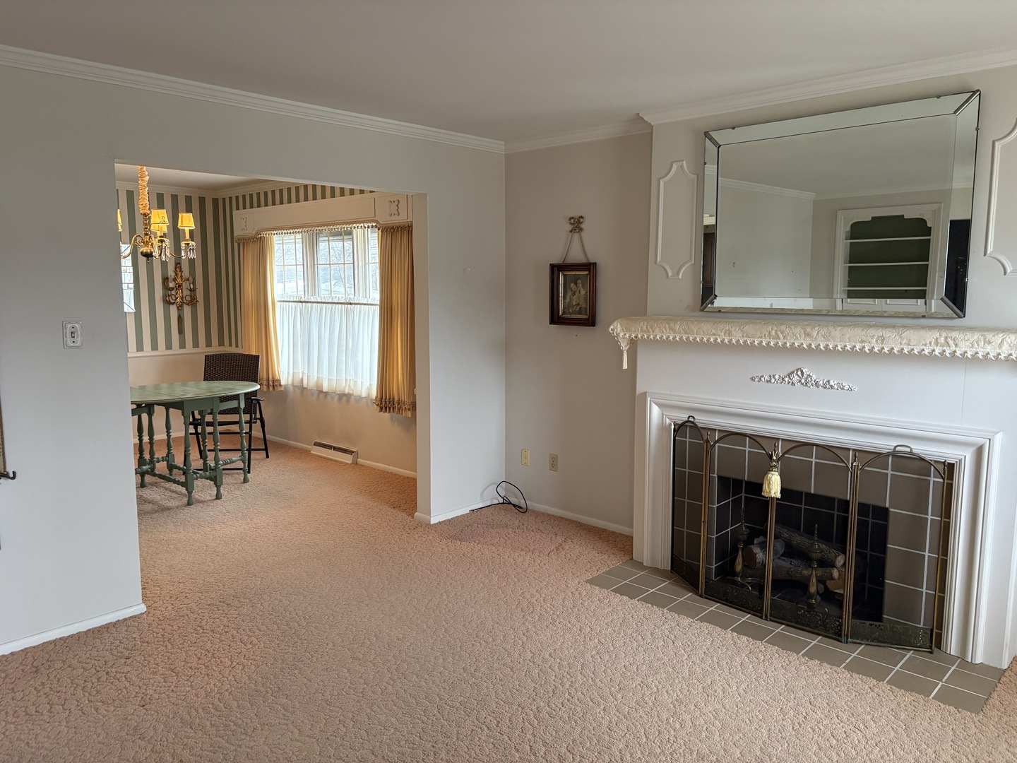 1740 Frazier Avenue Centralia, IL 62801 - Photo 6 of 12 wooden floor fireplace and windows in an empty room